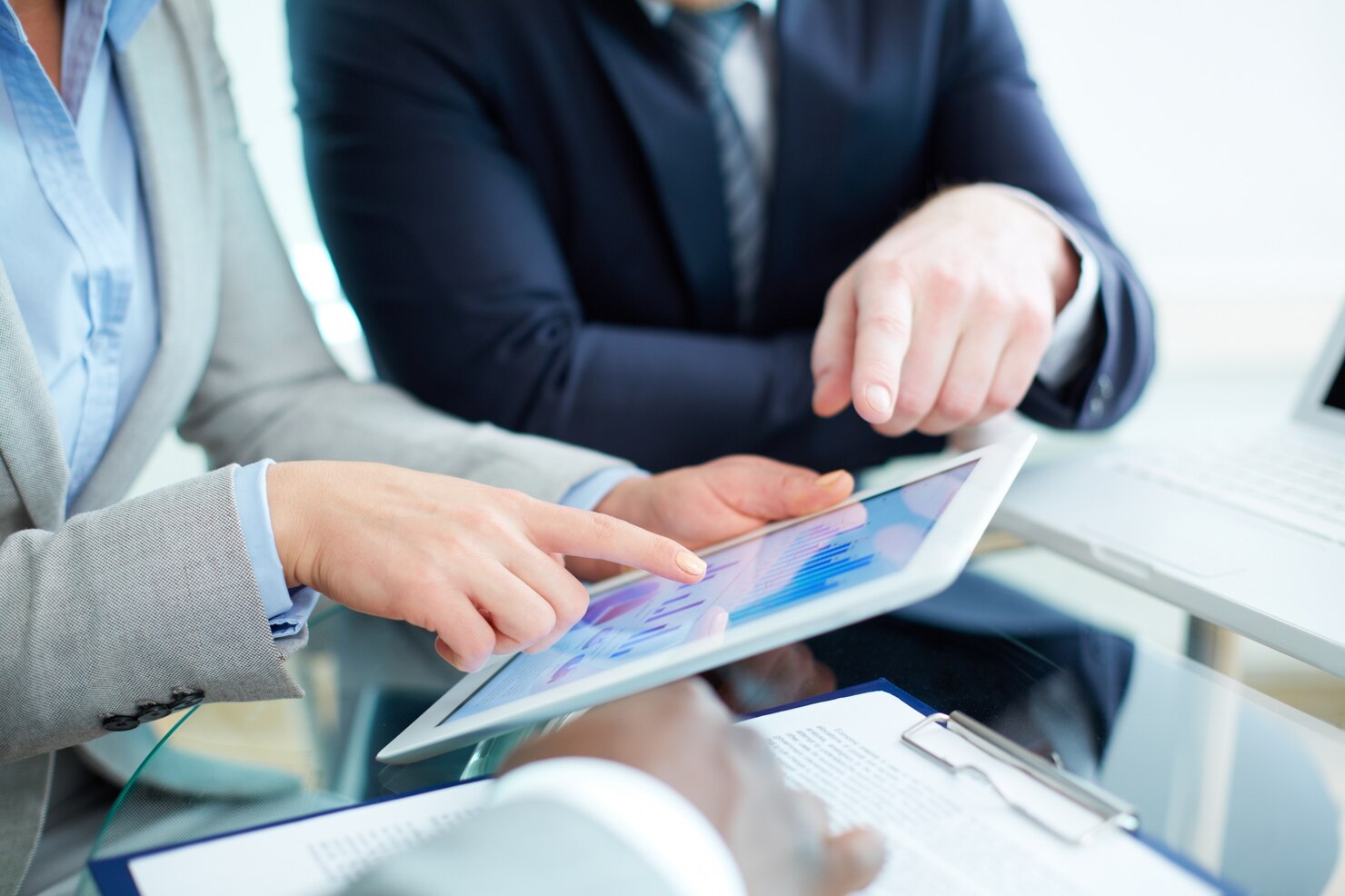 close up businesswoman pointing digital tablet 1098 1875